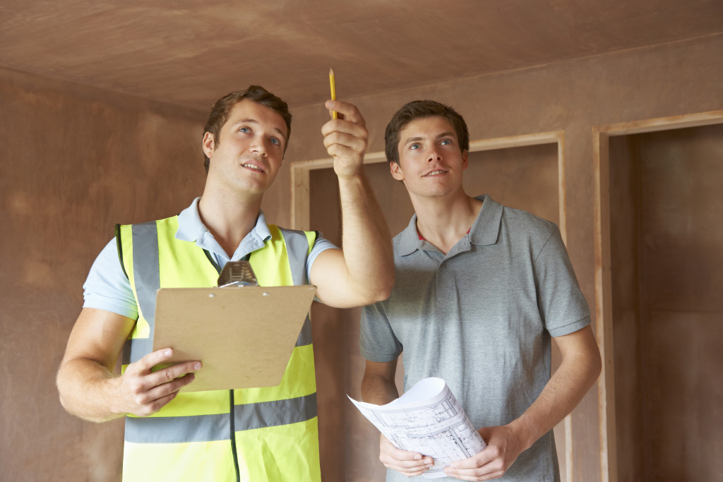 Professional home inspector inspecting a new property 