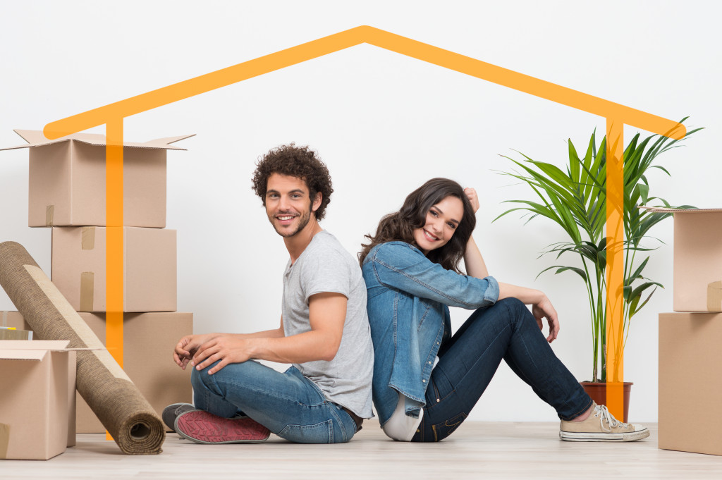 A young couple about to move in their new house